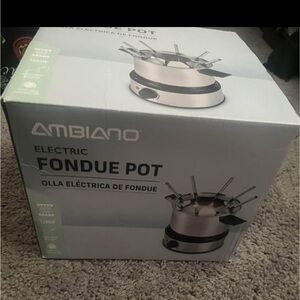Never used electric fondue set  … 1 year old
